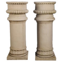 A pair of large columns made of stone from Italy