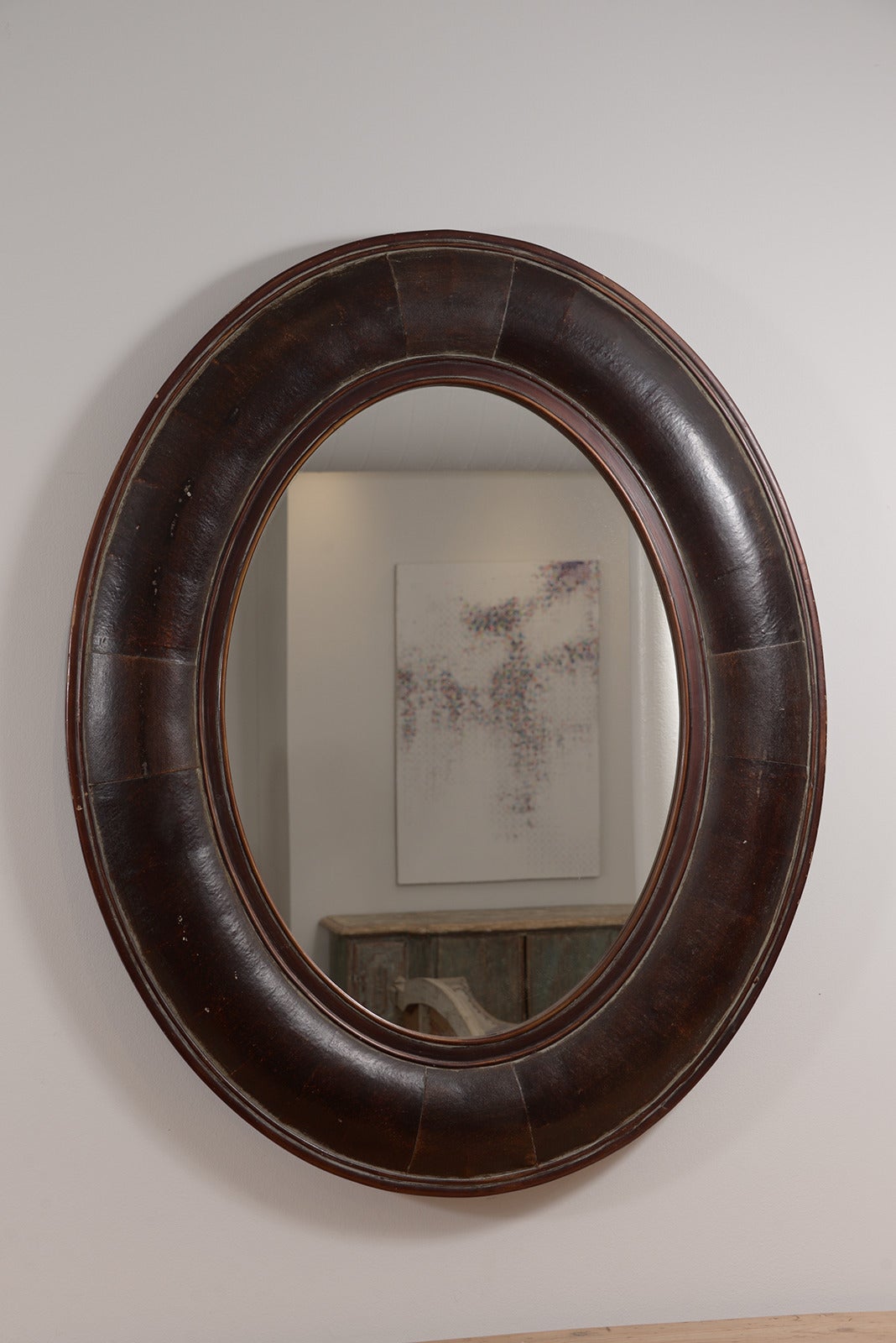Handsome French wood and leather mirrors from the 1940s, traces of paint.