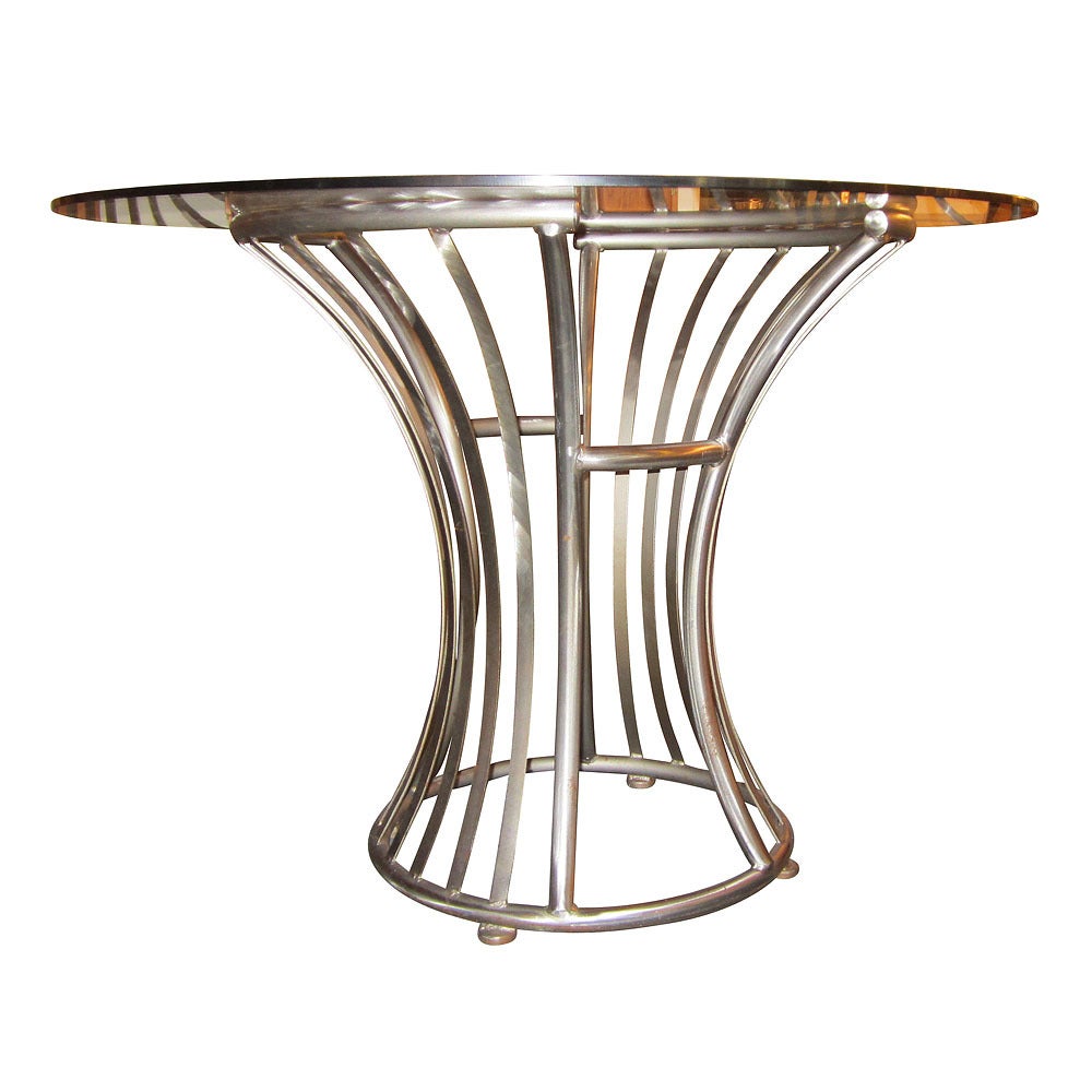 This table is constructed of stainless steel, reminiscent of 1940s French garden furniture. A great table for your outdoors or backyard. Matching chairs.
Pictured are also available and sold separately.