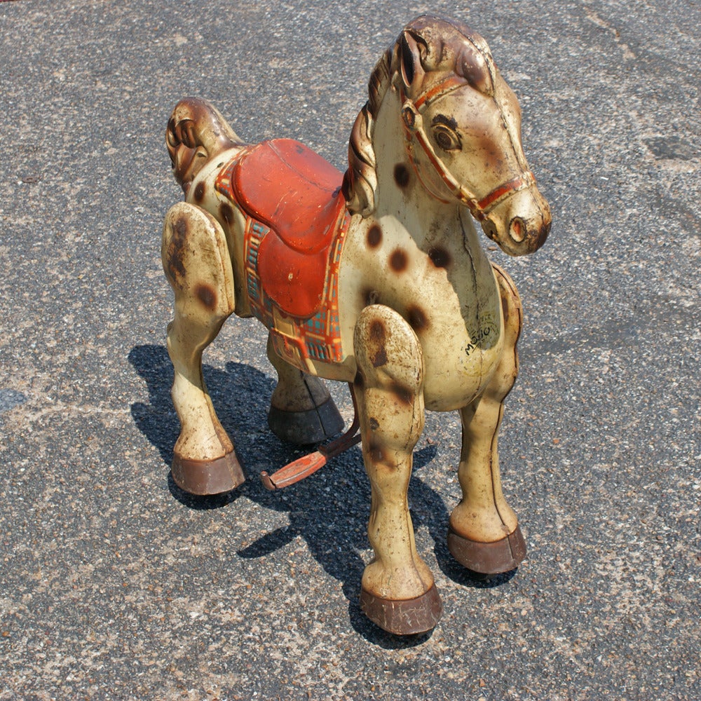 Vintage MOBO Bronco Metal Steering Rocking Horse London England

Mobo Spotted Bronco

`The Original All-Steel Walking Horse`

Used vintage large steerable ride-on rocking horse toy.
It measures approximately 27