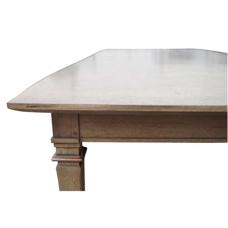 Mastercraft dining table of cerused, pale parchment, colored burl wood (possibly carpathian elm & mixed woods) with raised solid copper mounts. Insets are round copper pegs by upper moldings of tapered legs, and copper caps at bottoms of the legs.