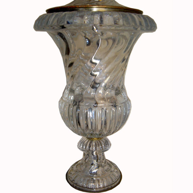 A glass table lamp by Paul Hanson with decoration and black faux marble base.