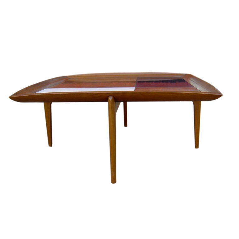 A mid century modern square coffee table designed by John Keal and made by Brown Saltman.  A walnut frame and top inlaid with black and white panels.  As shown in the last image, we also other matching Brown Saltman tables listed on 1stdibs.