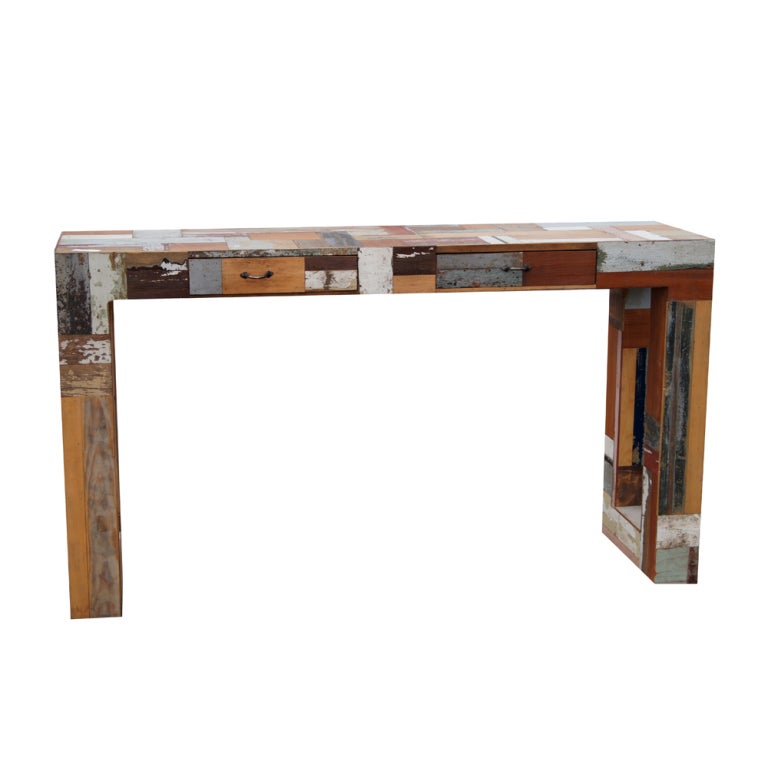 A charming Parson's style console table constructed of reclaimed wood in multi-color. 2 drawers.

 

 

  