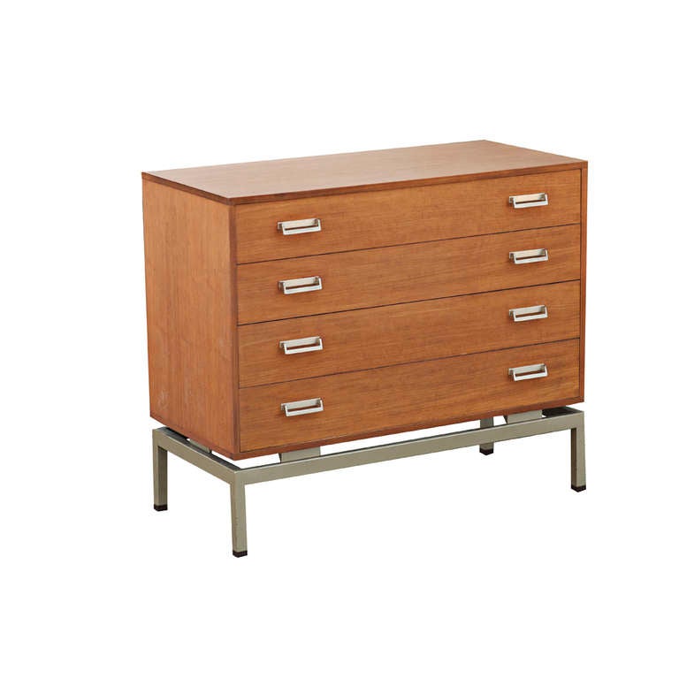Mid Century Modern G-Plan Limba Dresser 

Features teak construction with four standard drawers 
with a simple boxed aluminum frame.

A lovely addition to any Mid Century design