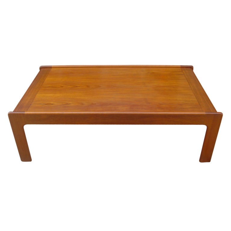 A mid century modern Danish coffee table designed by Svend Masden and made by Karl Lindegaard.  We also have a matching end and nesting tables available on 1stdibs.