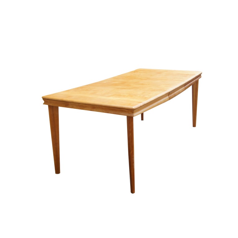 A mid century modern Heywood Wakefield dining table and six 