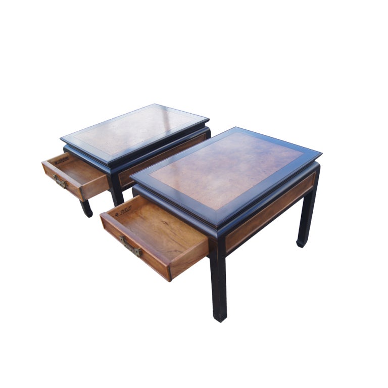 A pair of Asian motif side tables from the Chin Hua line by Century Furniture.  Burled ash construction with ebonized maple trim and bronze hardware.