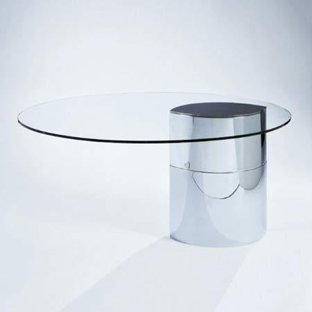A mid century modern table or desk designed by Cini Boeri and made by Knoll.  A chrome elliptical shaped base with a half inch tempered glass top.