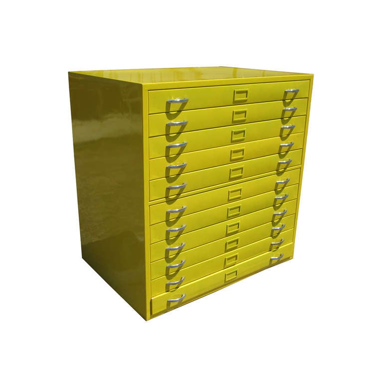 An eleven-drawer flat file by Mayline Co. Inc in bright yellow finish. With an excellent restoration, this architectural office piece is both stylish, useful and high-quality. With metal drawer pulls and easy sliding action. Powder coated during