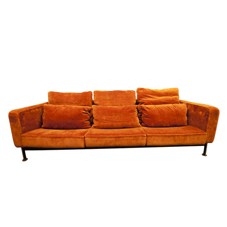 A mid century modern Atlas sofa designed by Robert Haussmann and made by Stendig.  A chrome frame with original orange velour upholstery.
