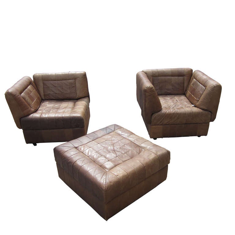 A Brazilian Modern, sectional leather sofa by Percival Lafer. The midsection has a backing piece that can come off and serve as an extra armrest for one of the other sections, effectively giving you two seats and an ottoman. This modular design is a