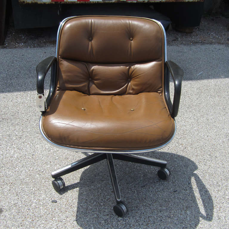 A stylish, vintage brown leather Executive Arm Chair by Pollock for Knoll International. With chromed steel frame and five-star base. Mid Century Modern office or side chair.