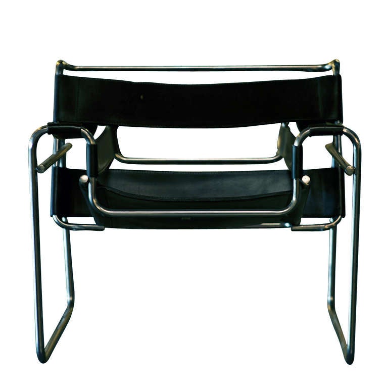 This is the most copied of all Breuer`s chairs. The frame was originally made from bent, nickeled, tubular steel. It later became chrome plated. The seat and the back are made from canvas , fabric or leather. It was designed for Kandinsky`s quarters