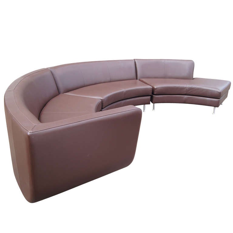 A modern and large  Menlo Park sectional sofa designed by Rick Lee and made by American Leather.  A curvaceous and playful contemporary design.  Designed by Rick Lee to showcase his signature organic shapes, the sofa collection can be arranged in a