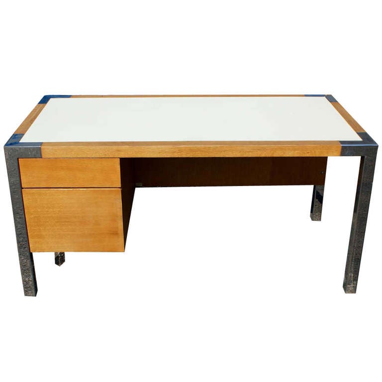 An absolutely stunning desk by Thonet, with wonderfully finished oak wood and chrome leg accents. The Top is a white laminate making the desk top virtually indestructible.