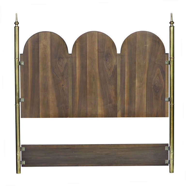Elegant burled amboyna and brass headboard by Mastercraft.  

Series of three arched panels with brass welting and brass spire-topped side posts.

See matching Mastercraft dresser.
