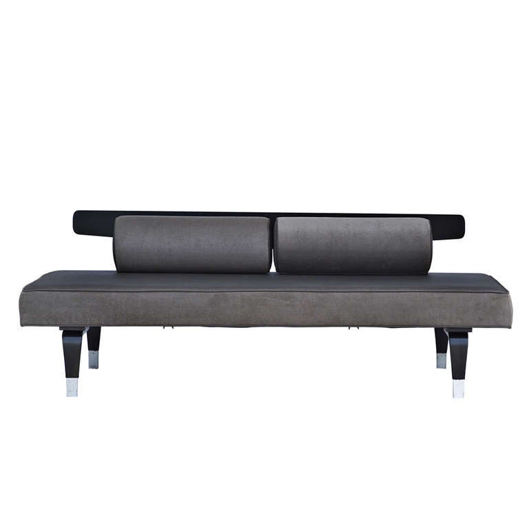 A mid century modern daybed made by Thonet. Ebonized, bentwood walnut frame with silver finish feet. Newly upholstered in faux suede fabric with two removable bolsters.