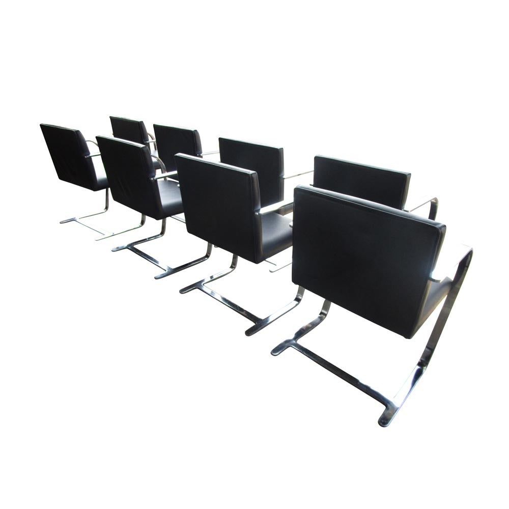 Vintage eight (8) Ludwig Mies van der Rohe Brno classics armchairs in near perfect vintage condition. This timeless design Brno remains a perennial favorite of design enthusiasts around the globe. 
Fully upholstered seats are in standard original