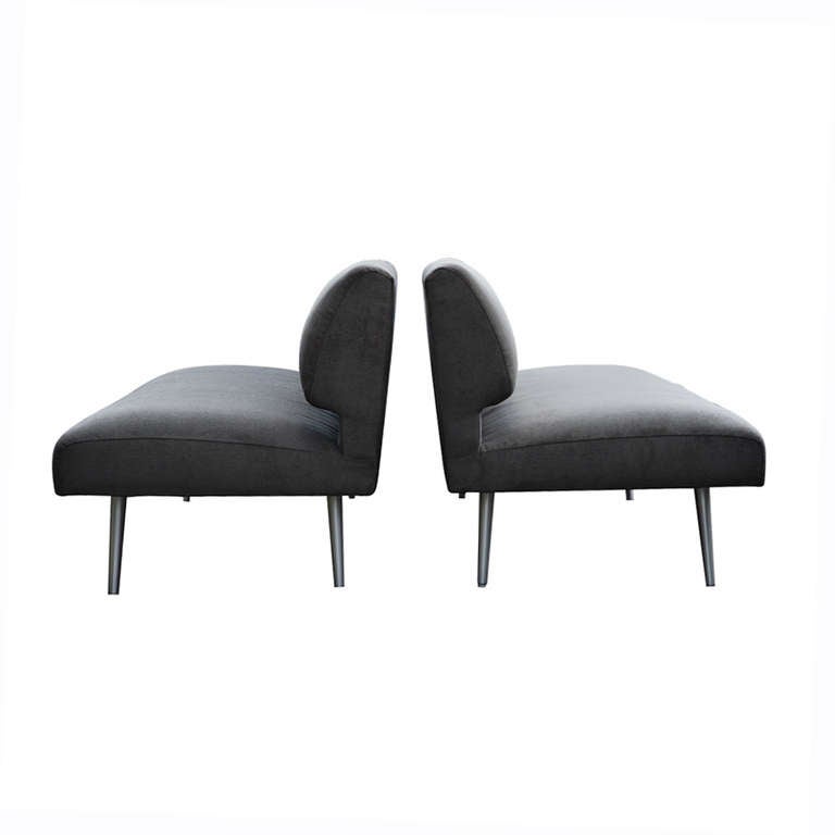 This minimalist, classic, gutter back sofa exeemplifies the later series produced in North Carolina. Both sofas retain original metal Dunbar label.

The sofa features metal legs

Available individually or as a pair of two, please inquire.  Price