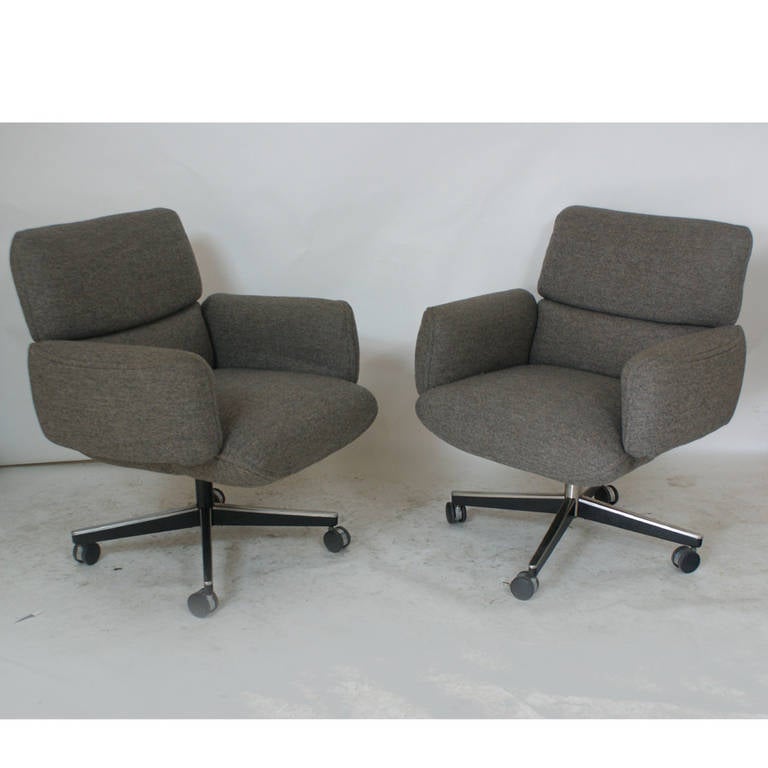 Chairs are upholstered in original gray fabric.
Four star swivel and tilt base with casters.
This listing is for 1 chair