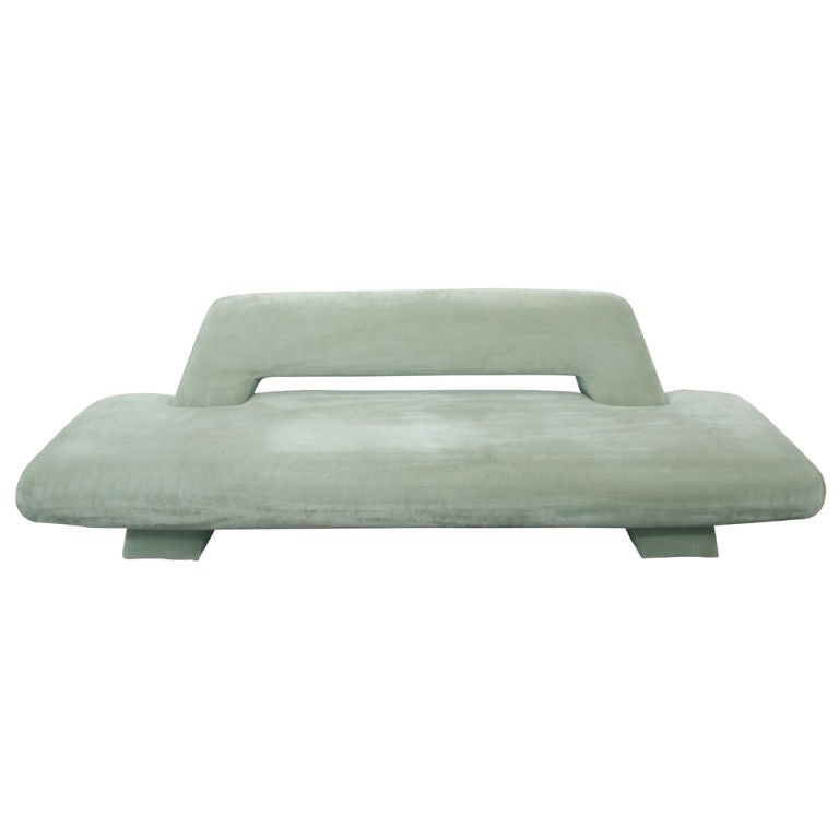 A pair of this classic of mid century modern design, the Mayan sofa was designed by Harvey Probber and made by his company.  Greenish mohair fabric sets off the graceful curves of this piece.