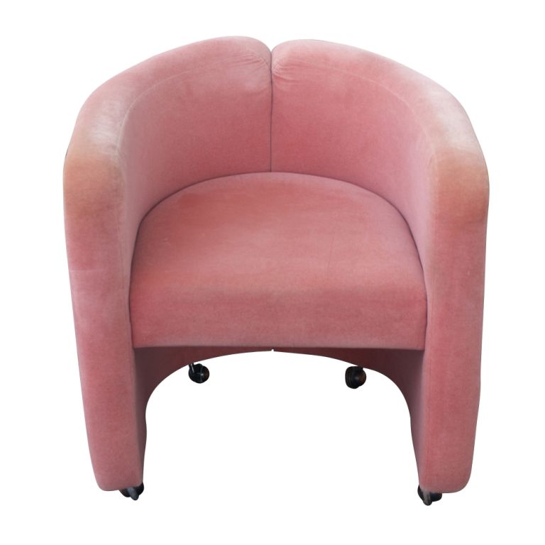 A pair of Mid-Century Modern armchairs made by Tecno. Salmon colored mohair upholstery on casters.  

Age Appropriate Wear.

Reupholstery Recommended.


