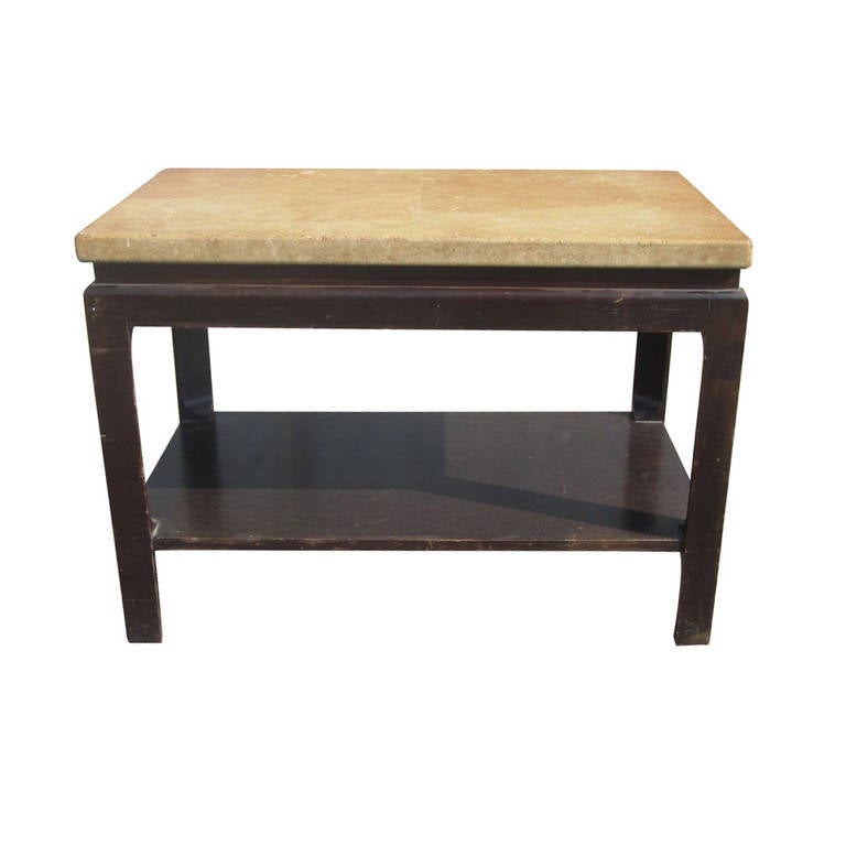 A vintage Art Deco side table designed by Paul Frankl for Johnson. This piece has solid cork top and sleek mahogany legs. A great example of the distinctive American Modern style pioneered by Frankl.