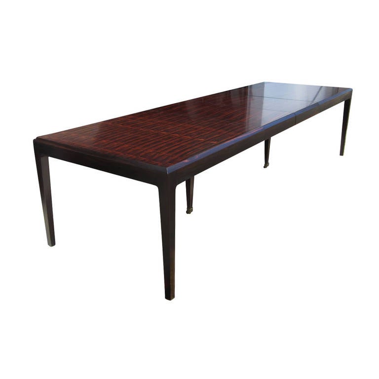 Vintage extendable rosewood dining table. The timeless Rosewood, and stylish design of this dining table is certain to impress. A great example of classic style and substance, perfect for any home or living space.