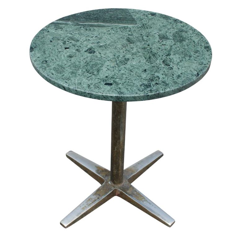 A pair of mid century modern side tables with green composite marble tops and chrome bases.