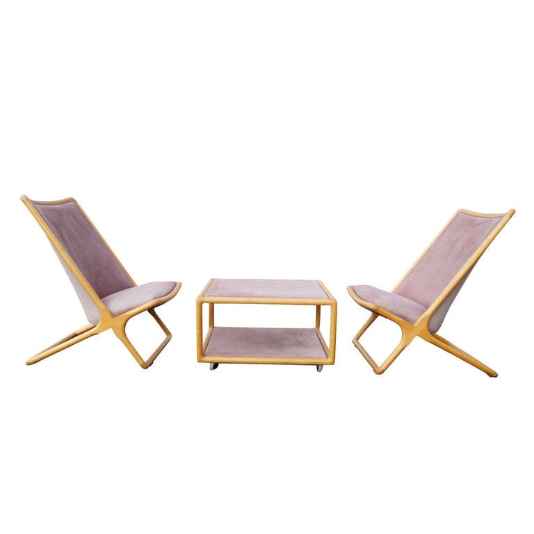 Original (2) Ward Bennett Scissor Chairs and a matching 2-tier Ottoman.

One of Bennett best and most beloved designs. Inspired by the hammock-style chaise of the mid-nineteenth century. Simple yet comfortable and functional art piece. Early rare
