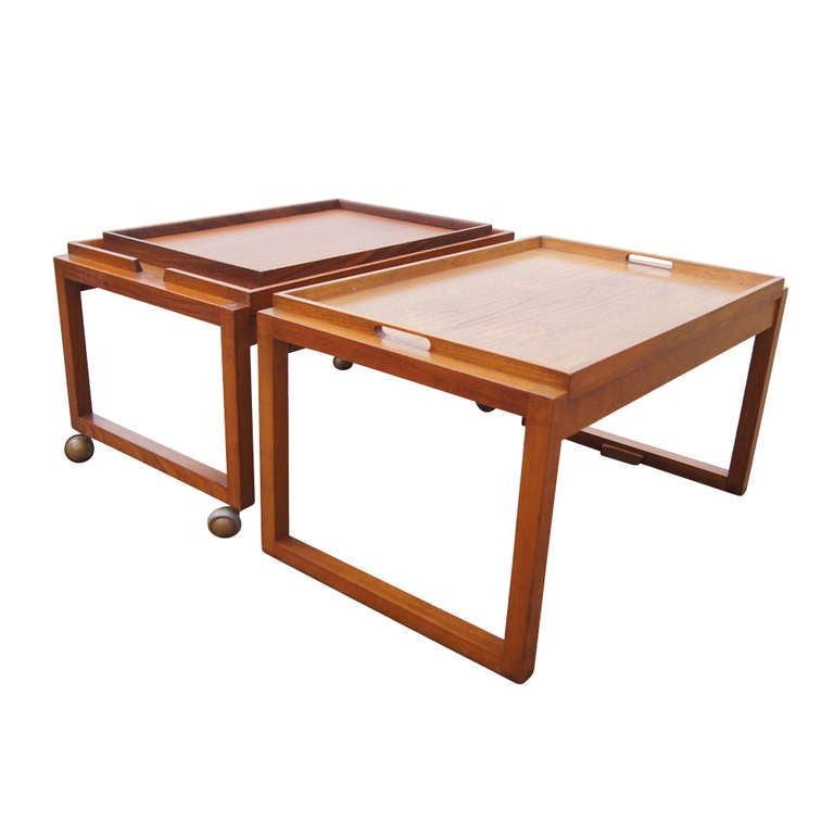 White and Newton of Portsmouth were on the cutting edge of furniture design and production in UK throughout the mid century. 
This teak wood tea serving cart can be used as a 2 tier serving trolley or be separate as a trolley and a serving table