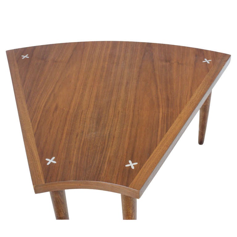 Walnut construction with unique star pattern in top.
Wood tapered legs.
33