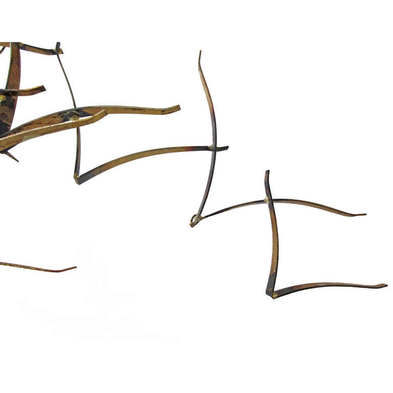 A metal wall sculpture depicting a flock of birds 

One of the larger examples we have ever seen of this type of sculpture by Bowie 

Signed with Bowie Signature Label