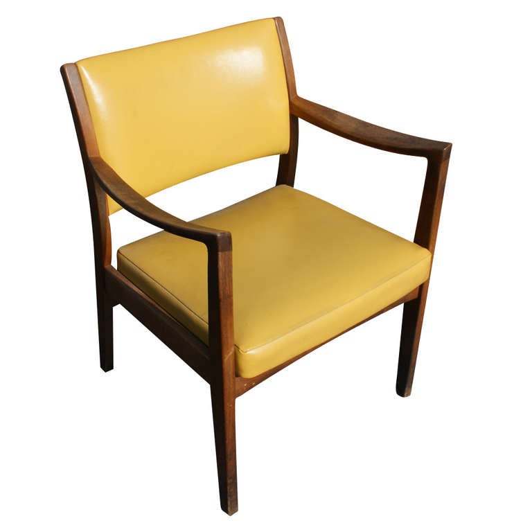 Vintage dining chairs by Johnson Chair Co Chicago with beautiful yellow vinyl upholstery and solid walnut wood frame construction.

Johnson Chair Co is the company that made chairs for The US House and Senate since 1889.   
These chairs were also