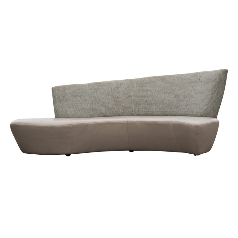 A sculptural modern sofa designed by Vladimir Kagan and inspired by the curves and undulations of the Guggenheim Museum in Bilbao Spain.  