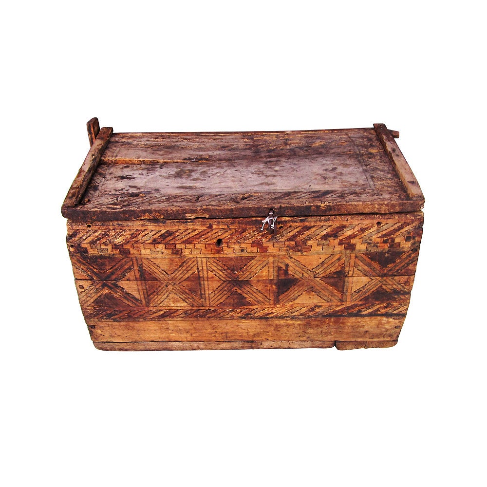Vintage Rustic solid wood Moroccan trunk chest. Hand carved wood Iron nails and small latch. A great piece to add aesthetic value to modern living spaces.