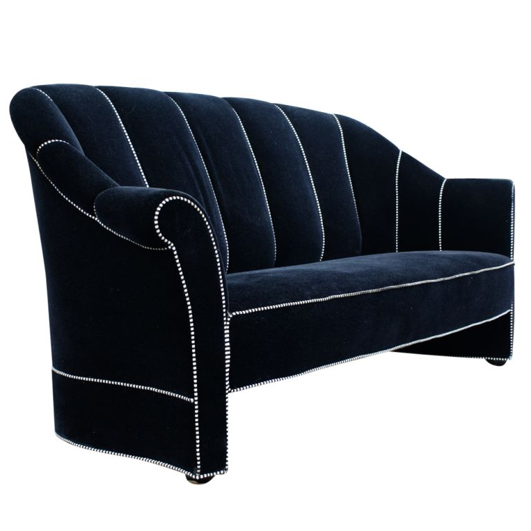 A Vienna Secessionist sofa designed by Josef Hoffmann and made by Wittmann of Austria. Originally designed for the Koller House in 1911, this is a licensed sofa from the latter part of the twentieth century. Black velvet with black and white