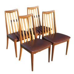 Four Walnut Armless Dining Chairs
