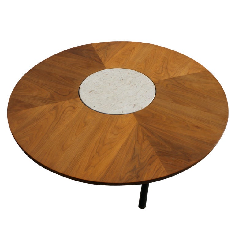 A mid century modern table designed by Harvey Probber which could be used as a coffee table or gaming table.  Walnut top with a travertine marble insert and an ebonized wooden base.