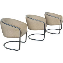 Three Cantilevered Chrome And Fabric Barrel Chairs
