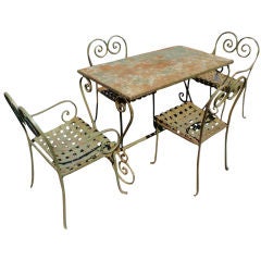 Vintage Metal Outdoor Table And Four Chairs