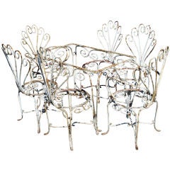 Ornate Wrought Iron Outdoor Table And Six Chairs
