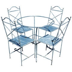 Used Wrought Iron Outdoor Table And Four Chairs