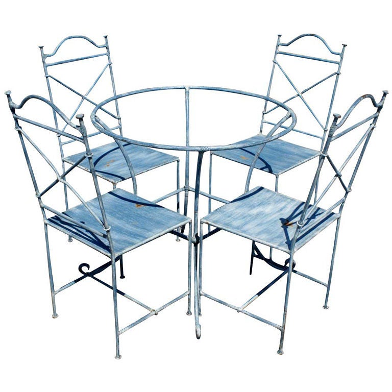Vintage Wrought Iron Outdoor Table And Four Chairs at 1stdibs