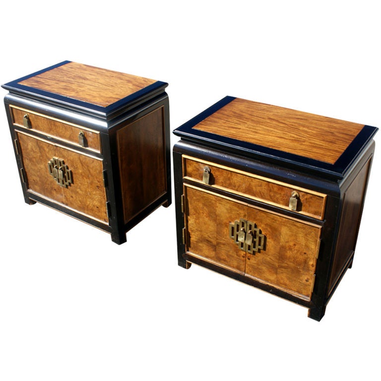 A pair of nightstands made by Century Furniture from their Chin Hua' An line.  One drawer and doors concealing shelved storage.  Ebonized maple with burled ash panels in an Asian design.  As shown in the last image, we also have a matching dresser