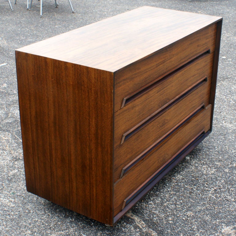 A vintage Mahogany and Rosewood Dresser for Drexel Perspective designed by Milo Baughman. This is a rare and early design for Baughman.