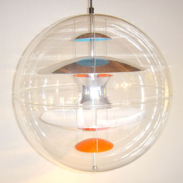 A large, original, and early production globe light designed by Verner Panton and made by Louis Poulsen. An icon of Mid-Century Modern design. A 20