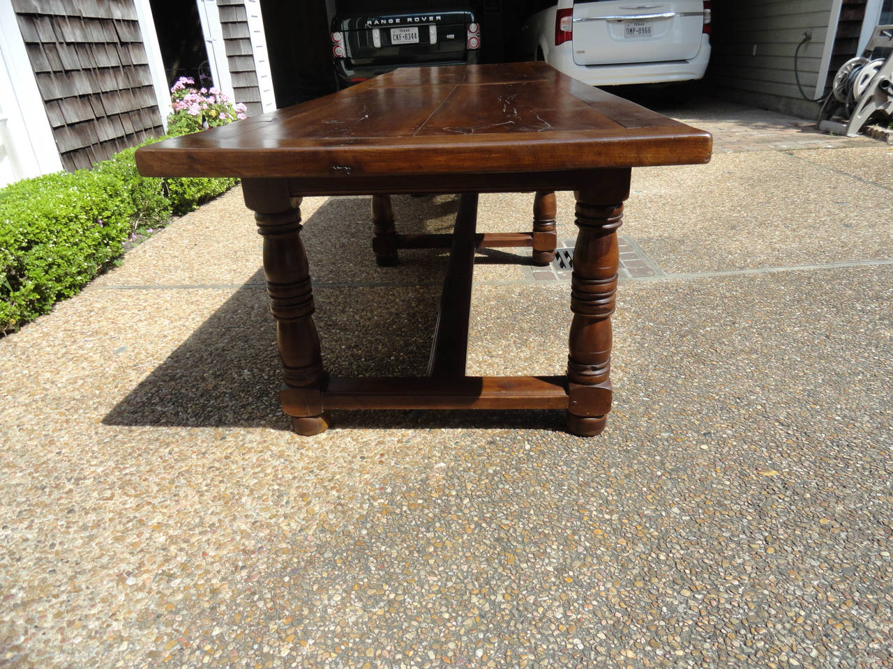 19th century French trestle table from Provence with bread board ends. Table is fabricated in walnut. Excellent French polish finish.