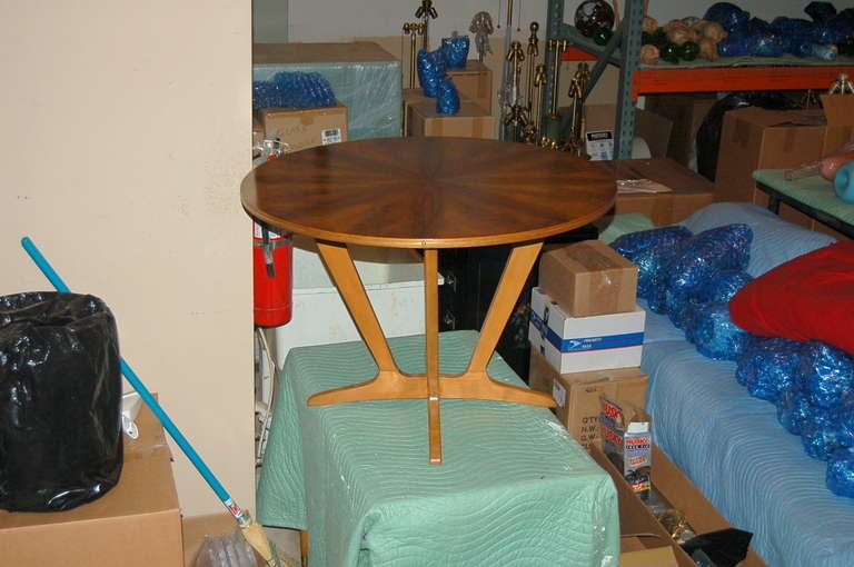 An exquisite table - the top of inlaid starburst surrounded by spectacular grain. The edge is trimmed with a strip of brass. First position feet add to the style. Totally redone!

The table is 24 inches high and 36 inches across the top. Marked